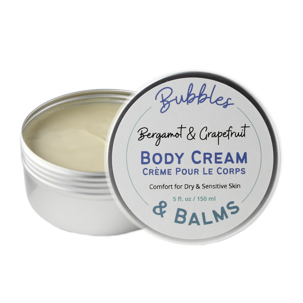 Bubbles &amp; Balms Bergamot &amp; Grapefruit Body Cream for dry &amp; sensitive skin opened and showing a smooth, absorbent texture.